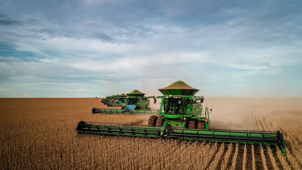 Combined harvesters in a soya bean field in Brazil